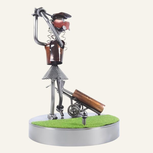 Figurine golfeuse en métal
