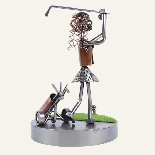 Figurine golfeuse en métal