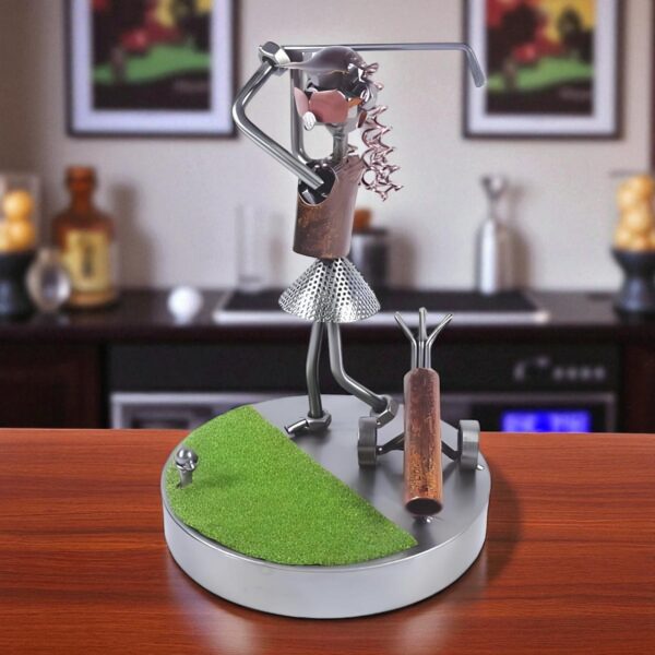 Figurine golfeuse en métal