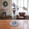 Figurine tromboniste femme en métal