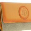 Grand portefeuille femme orange en cuir et toile avec protection RFID