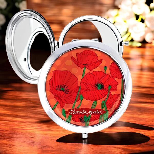 Un miroir de poche rond avec un dessin original modèle poppy